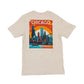 Beige t-shirt with a colorful graphic of Chicago skyline on a white background