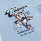 Light blue t-shirt with a cartoon baseball character holding a bat and 'Chicago' text on a white background