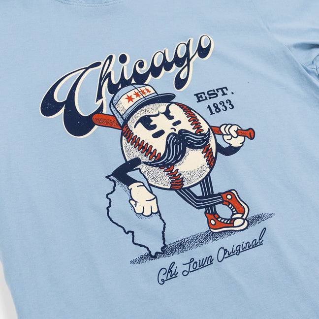 Light blue t-shirt with a cartoon baseball character holding a bat and 'Chicago' text on a white background