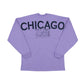 Purple long sleeve shirt with CHICAGO EST. 1837 and a Chicago city skyline across the back, set against a white background.