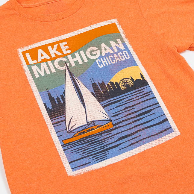 Orange t-shirt with a graphic of Lake Michigan and Chicago skyline on a white background