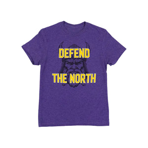 A purple heather crewneck t-shirt featuring a graphic of a horned Viking warrior with the text 'DEFEND THE NORTH' printed in yellow and black.