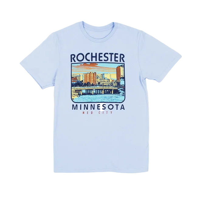 A light blue colored t-shirt with a city scene and text "Rochester, Minnesota Med City" on a white background.