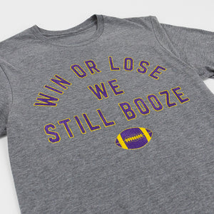 Graphite gray t-shirt with purple and yellow text that reads "Win or Lose We Still Booze" with a football, set against a white background.