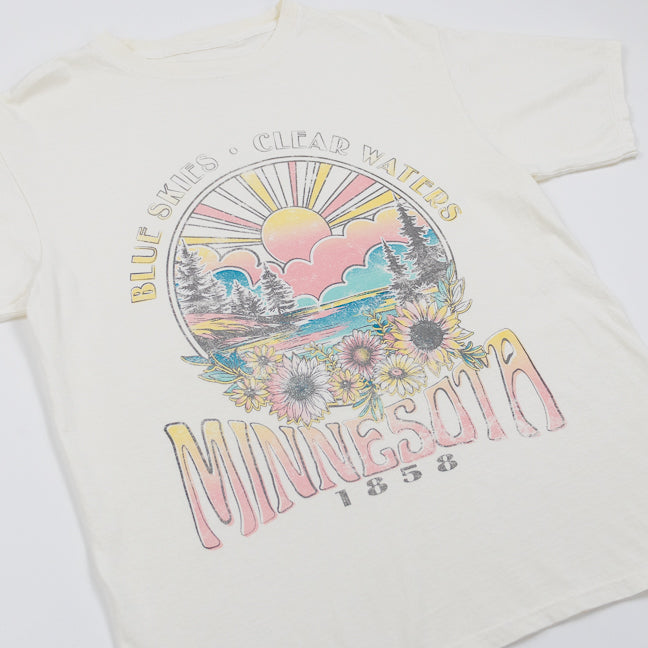 Ivory colored t-shirt with a colorful 'Minnesota' graphic design on a white background