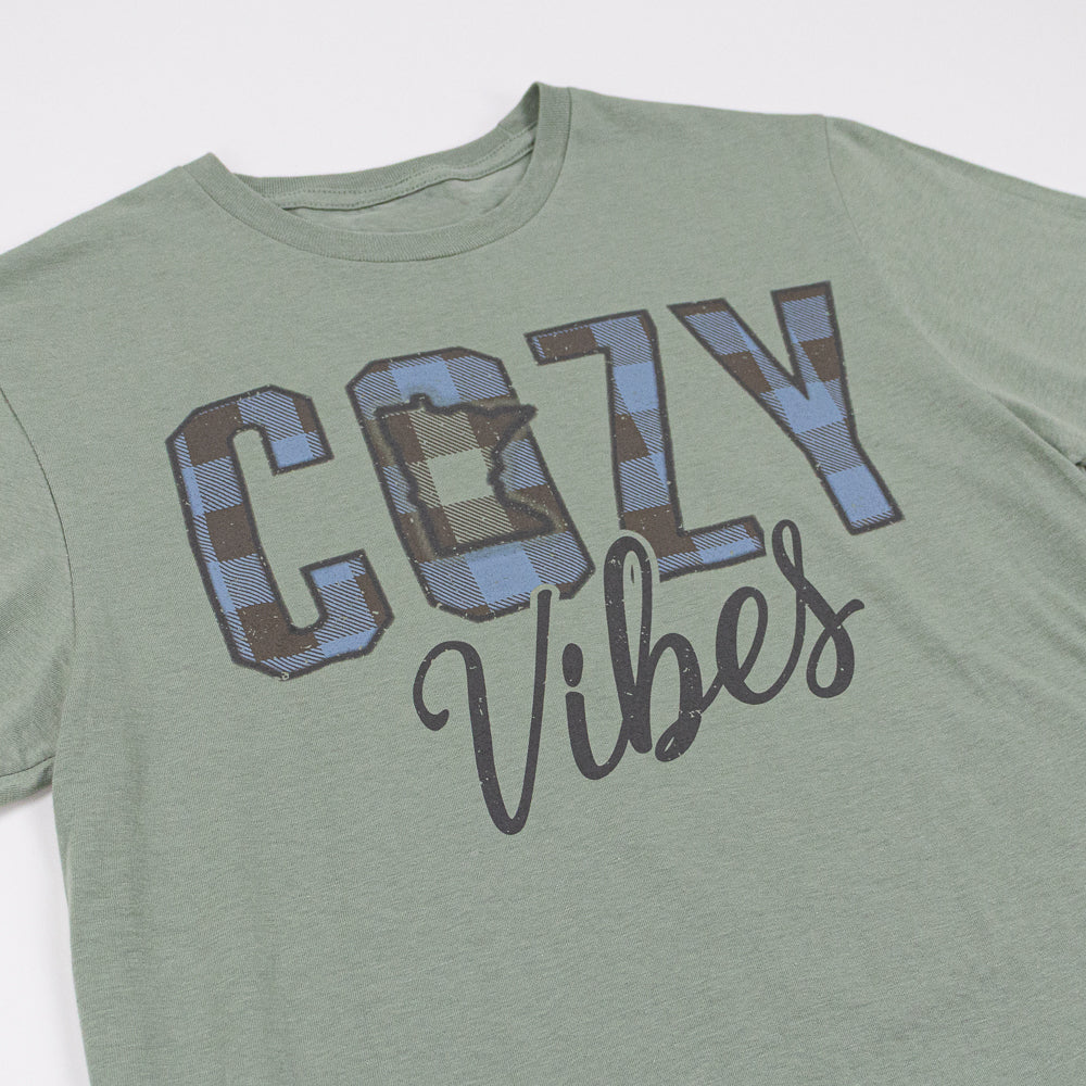 Green t-shirt with 'Cozy Vibes' text on a white background