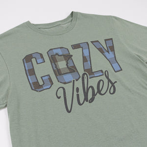 Green t-shirt with 'Cozy Vibes' text on a white background