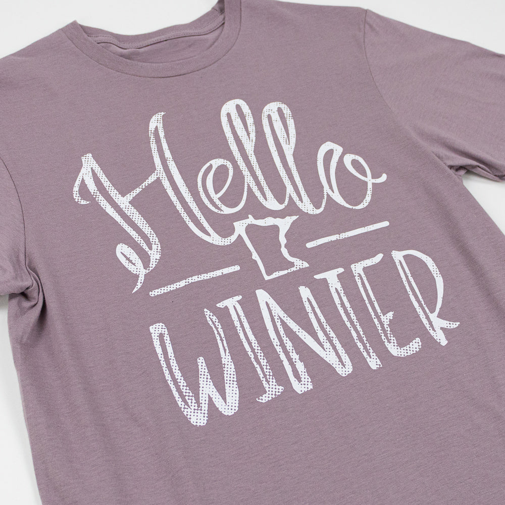 Purple t-shirt with 'Hello Winter' text on a white background