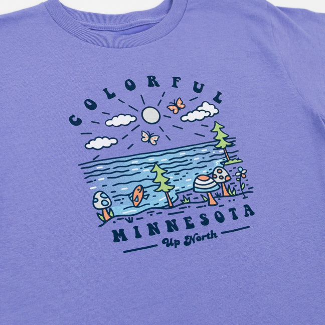 Purple t-shirt with a colorful graphic design of nature elements and 'Colorful Minnesota Up North' text.
