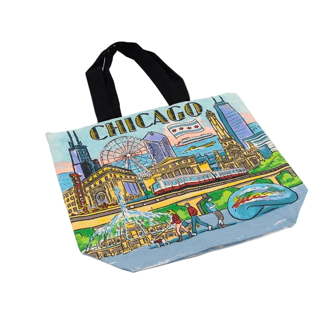 A tote bag featuring a Chicago scene against a white background.